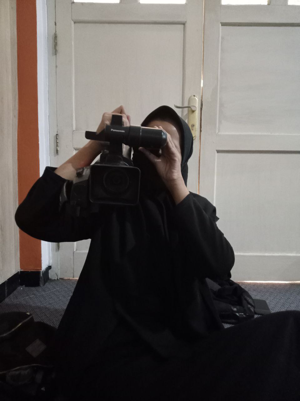 Portrait of portfolio creator – back view