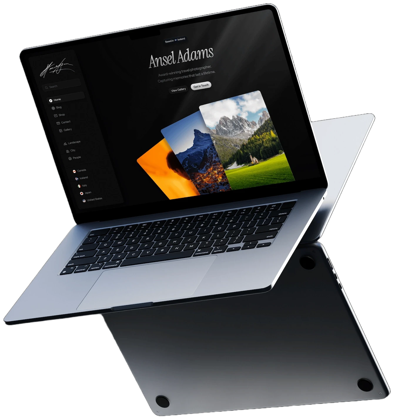 Laptops floating with front laptop displaying photography website