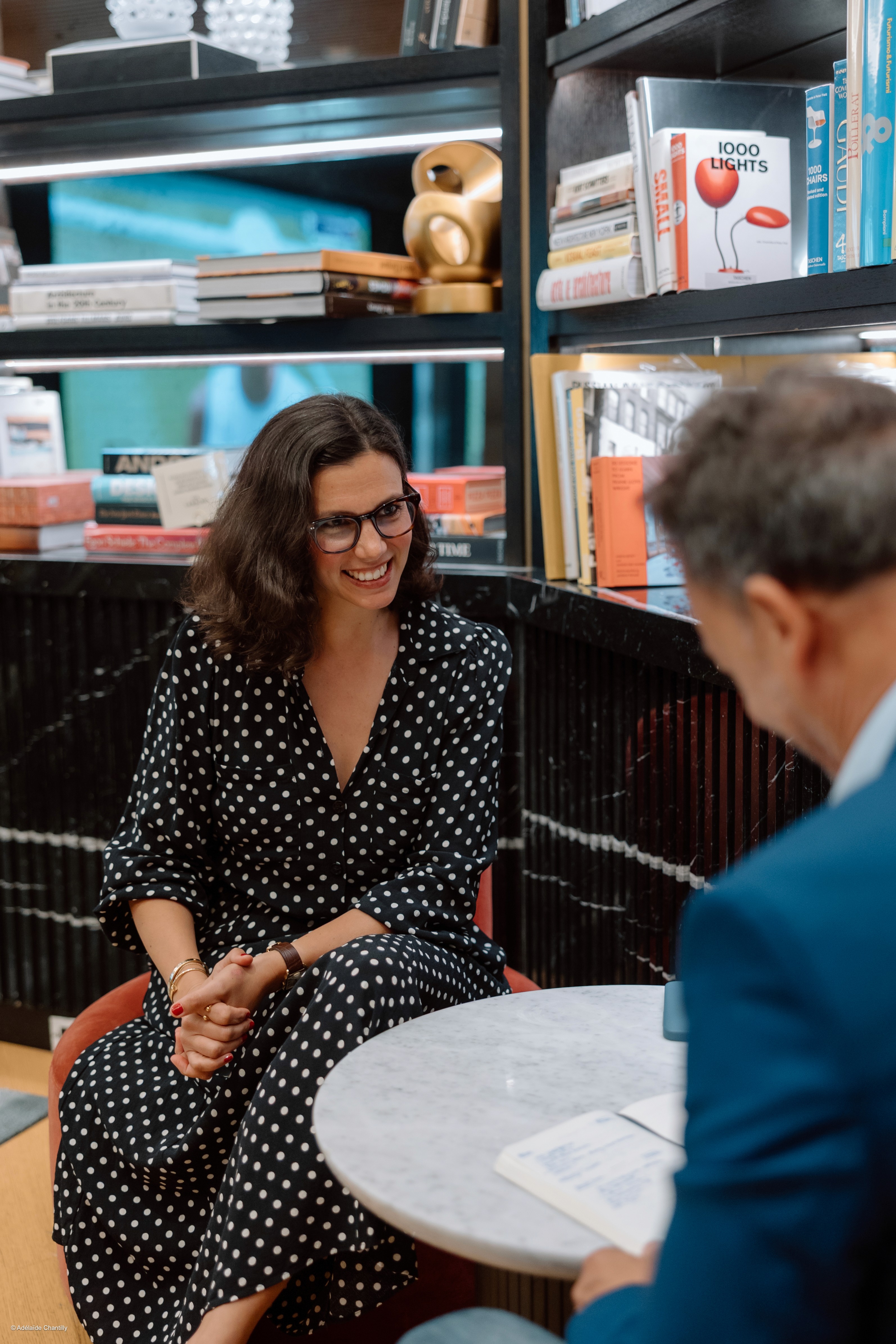 Chloe talking to a client about startup scaling