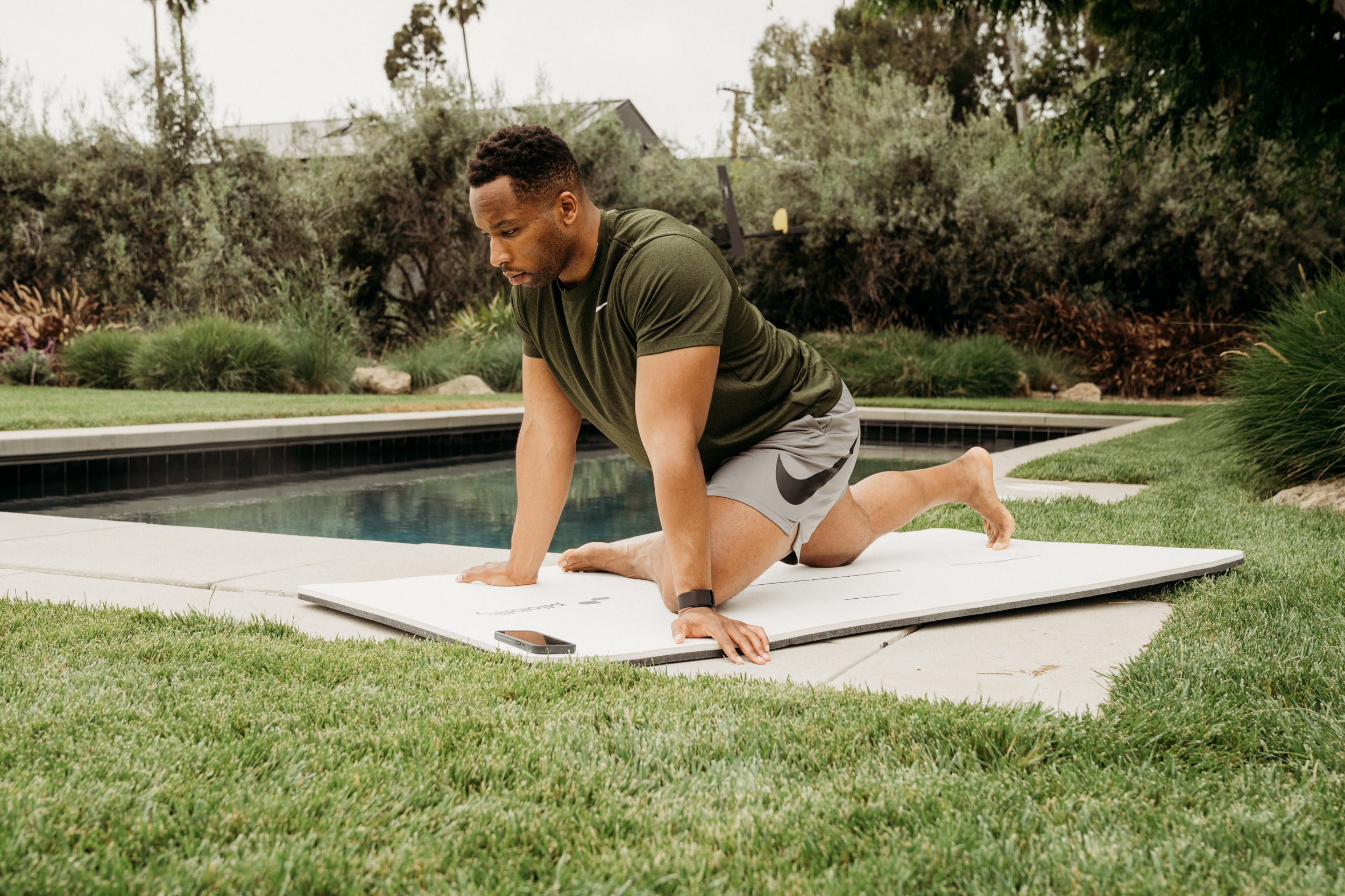 Man Wearing Watch Doing Exercise - Leg Mobility Exercises