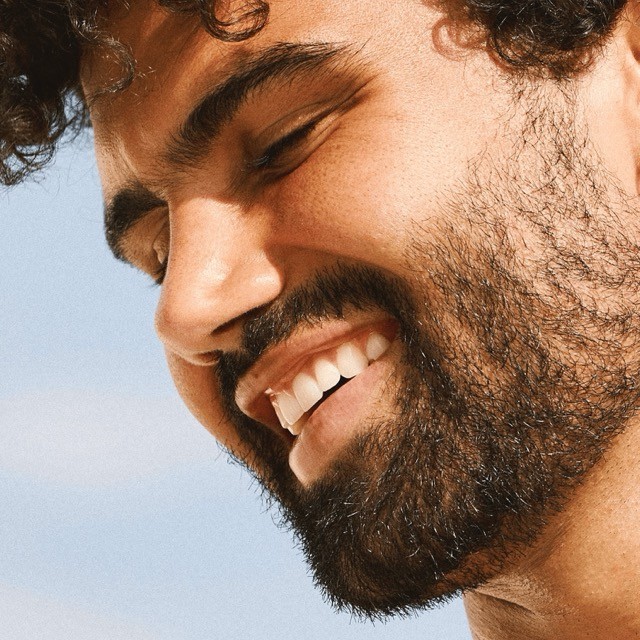 Man with beard smiling