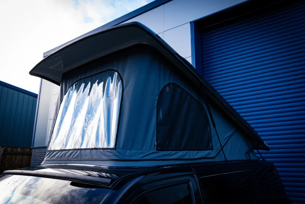Pop top enhances natural light in VW Transporter Camper van with three windows