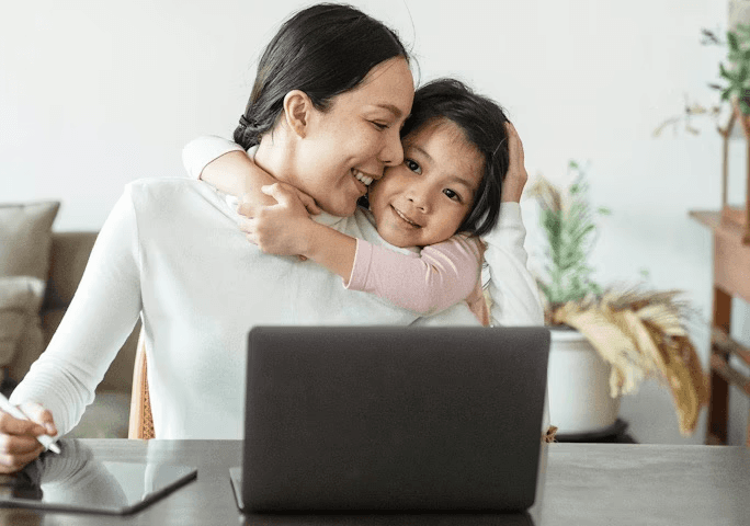 A babysitter from Charly Cares helps during remote work