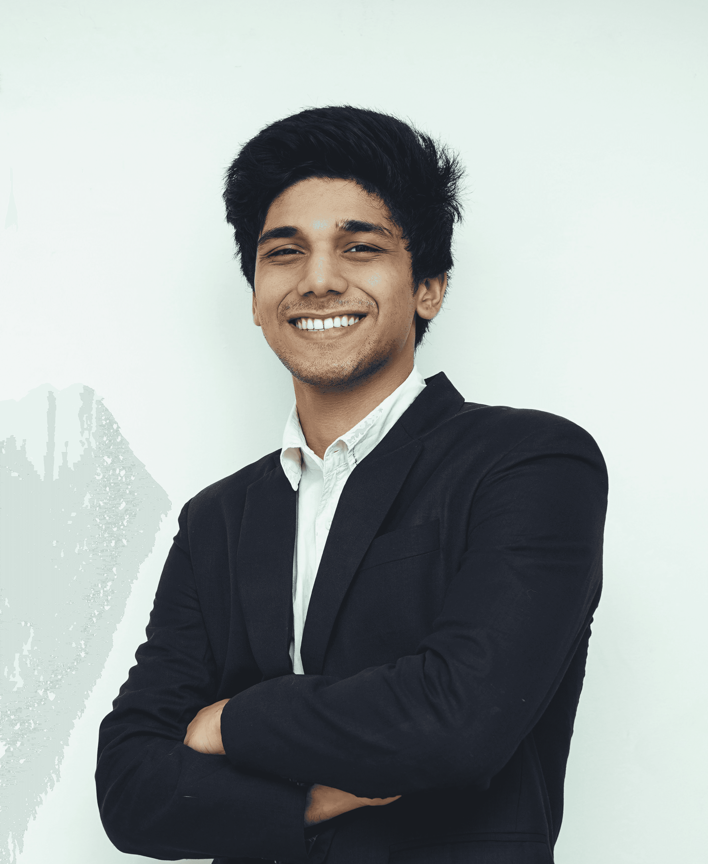 man in black suit jacket smiling