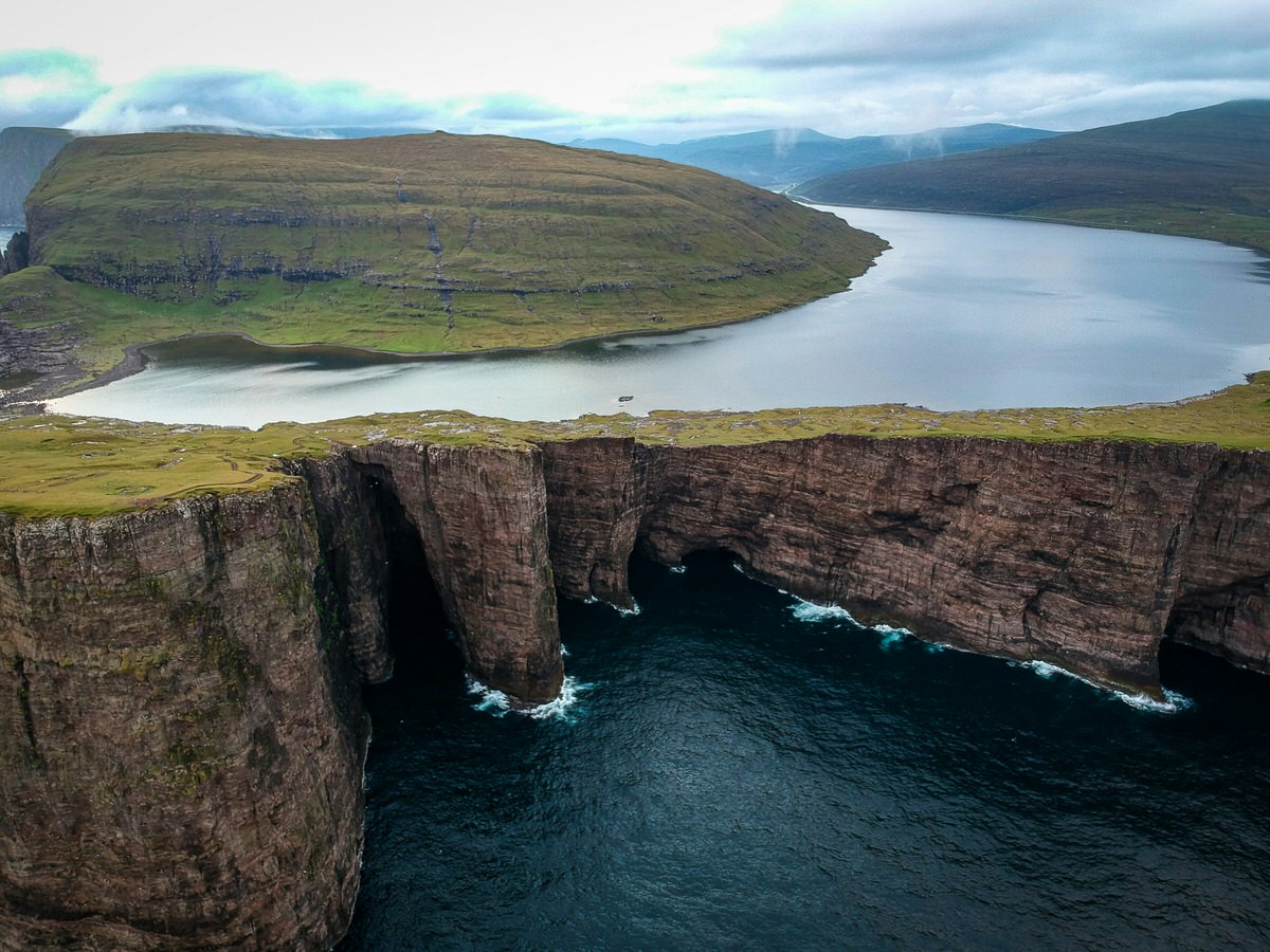 Sørvágsvatn lake faroe islands floating above ocean with cliffs