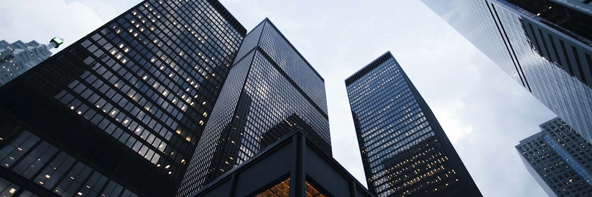 Modern office buildings representing different industry sectors