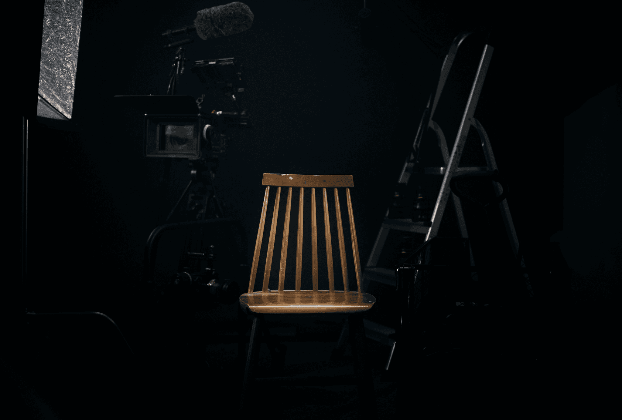 Black and white photo of man posing on camera