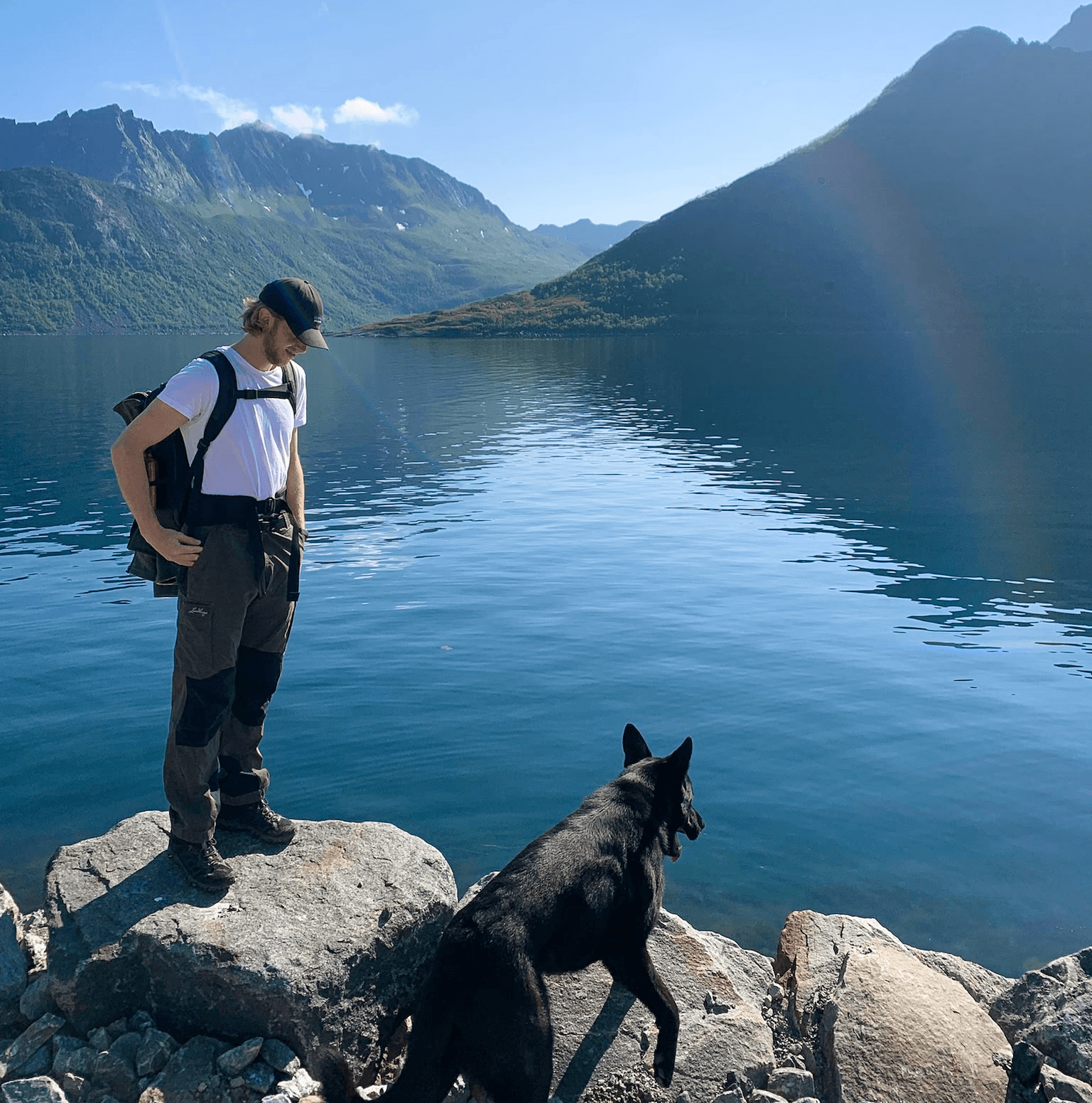 Lukas and a dog by the water
