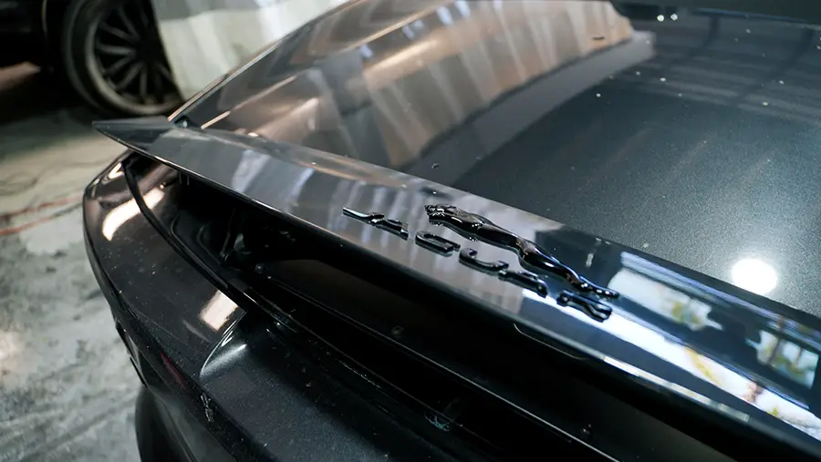 Close-up of Jaguar vehicle badge after auto body refinishing service in Simi Valley, CA