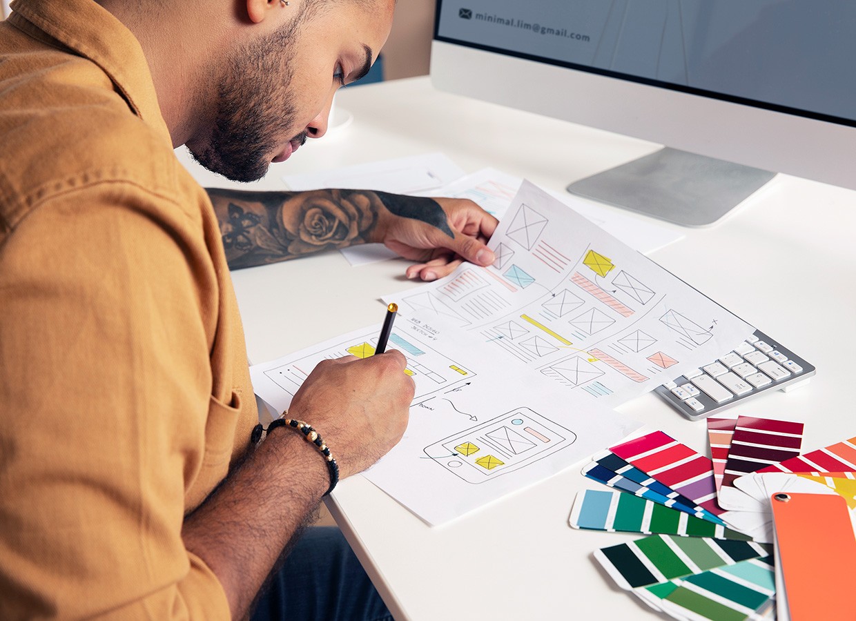 high angle man designing websites