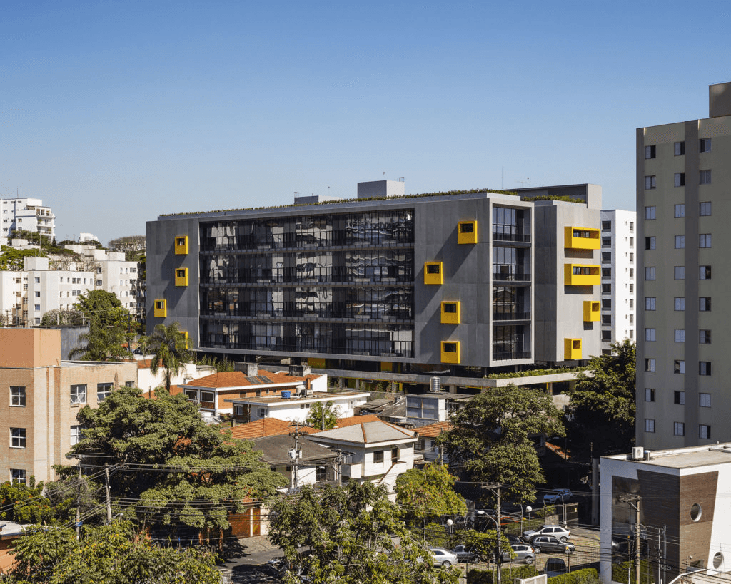 a building with trees and plants