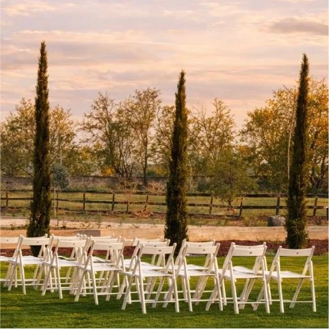Fields and a winding road stretch across the landscape.