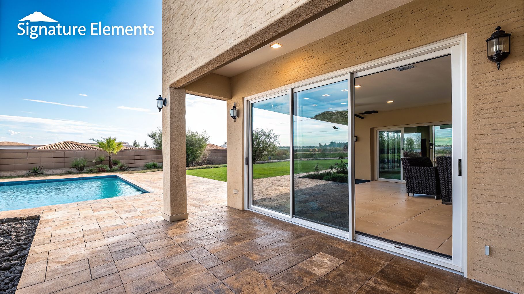A luxurious Florida-style home featuring a swimming pool, tiled patio, and sliding glass doors.