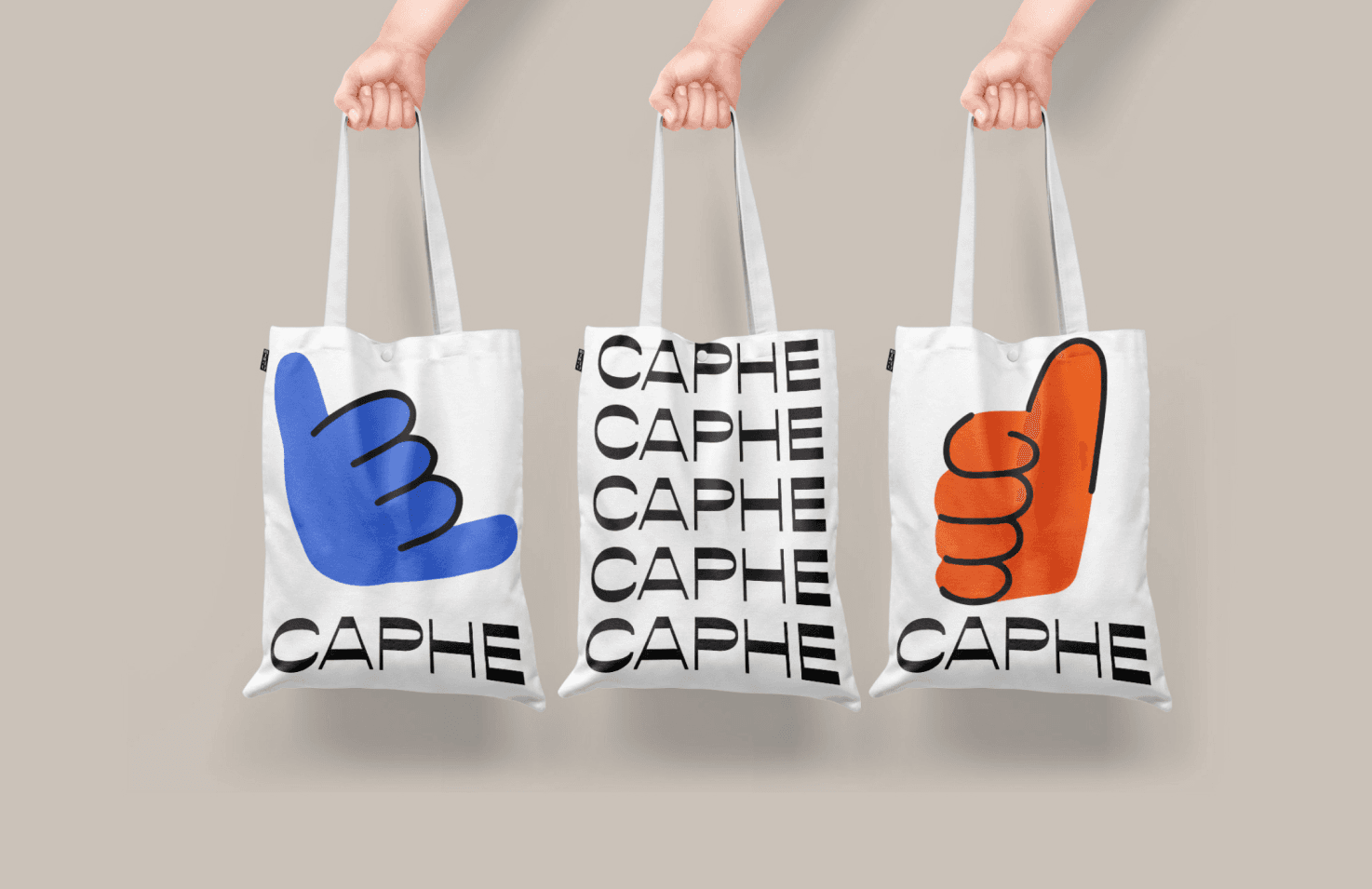 Three totebags with Caphe's logo and illustrations
