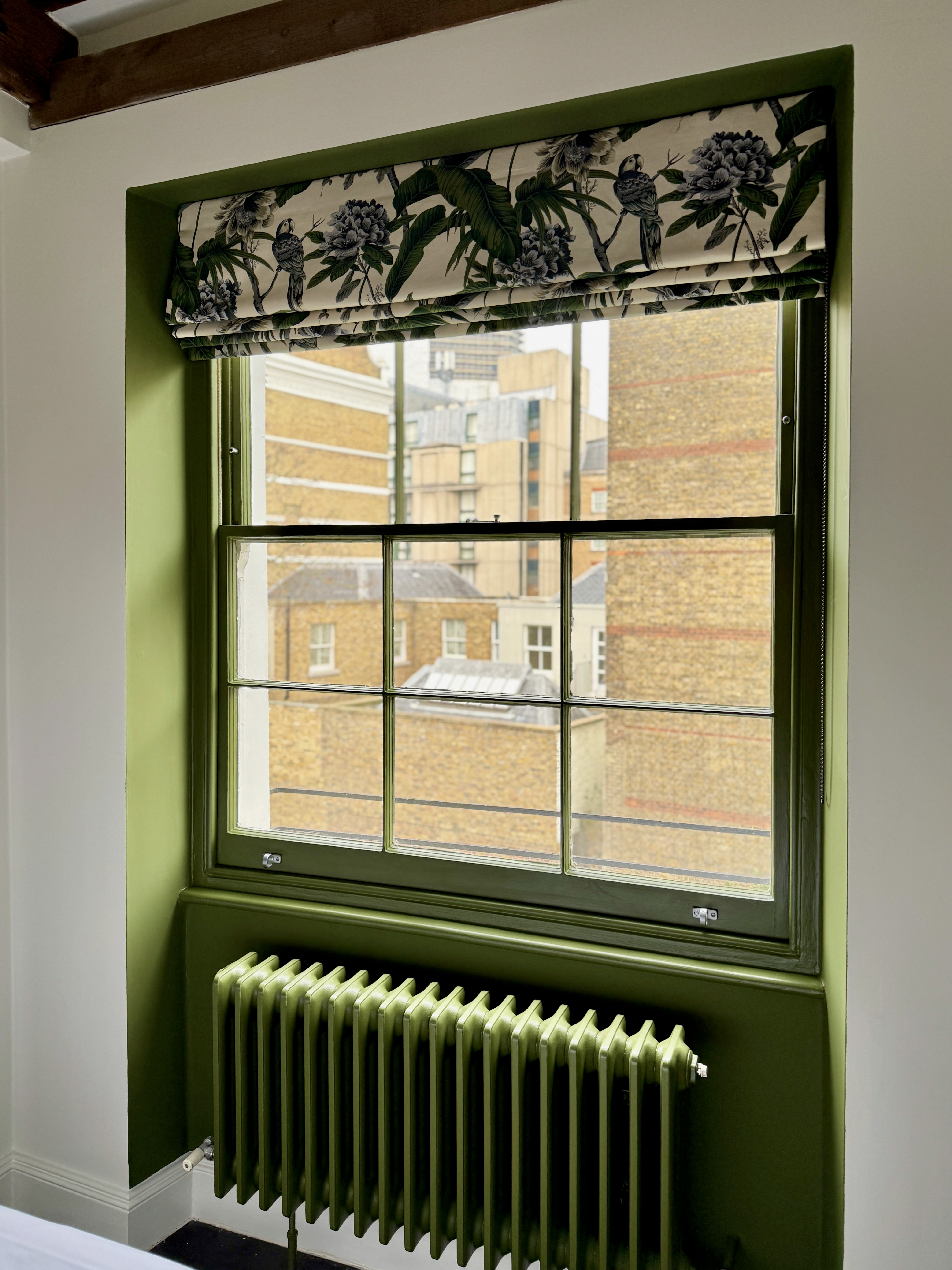 white sofa chair near fireplace