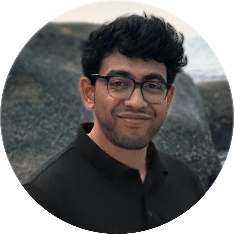 A photo of a man wearing a cap looking above