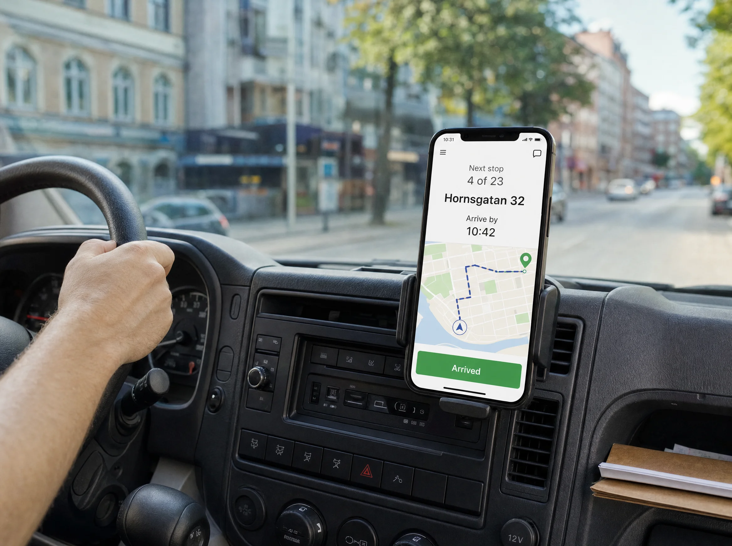 Rutby driver app on a phone mounted in a van, showing the next stop