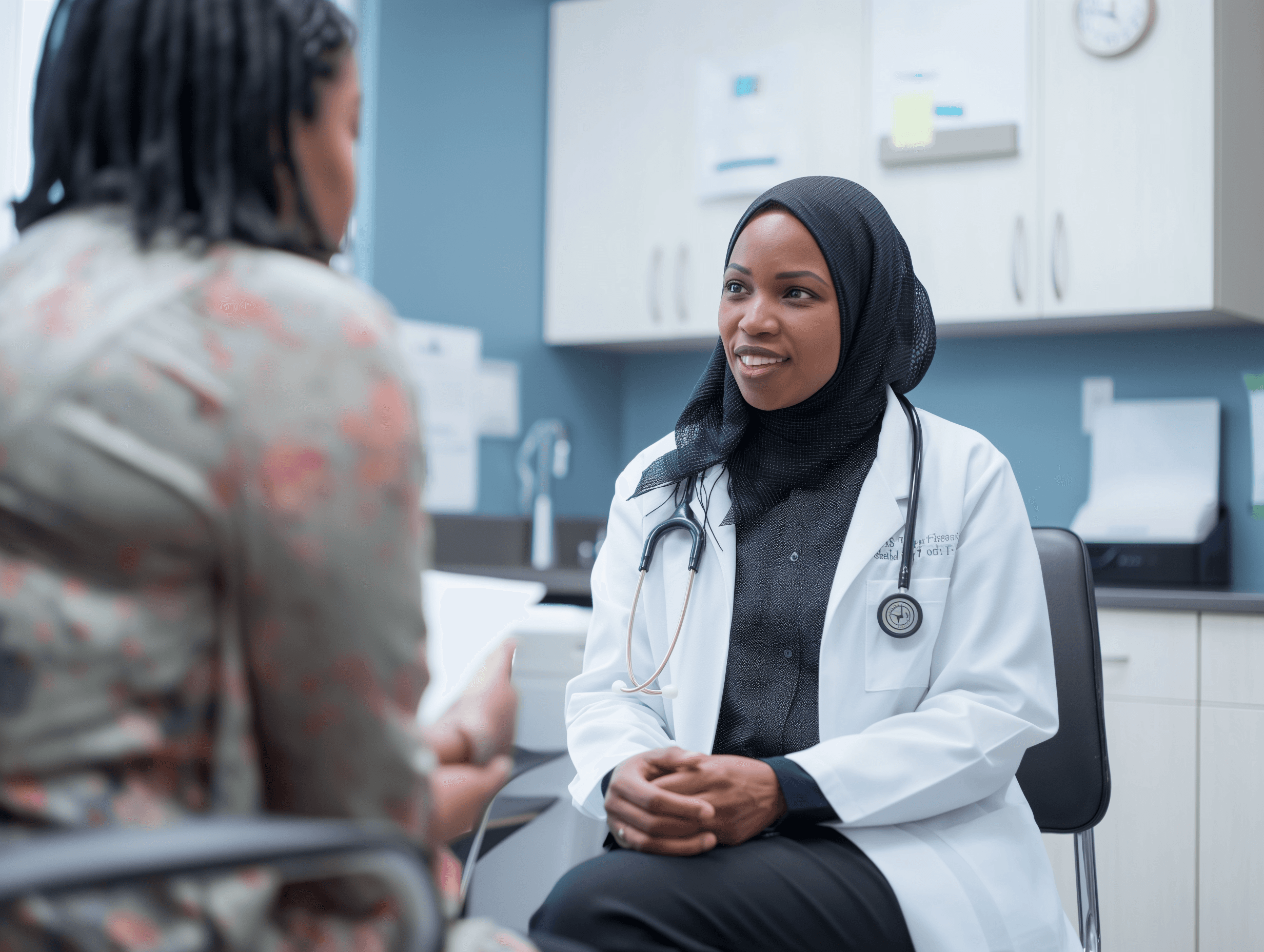 Two woman talking in a medical environment 