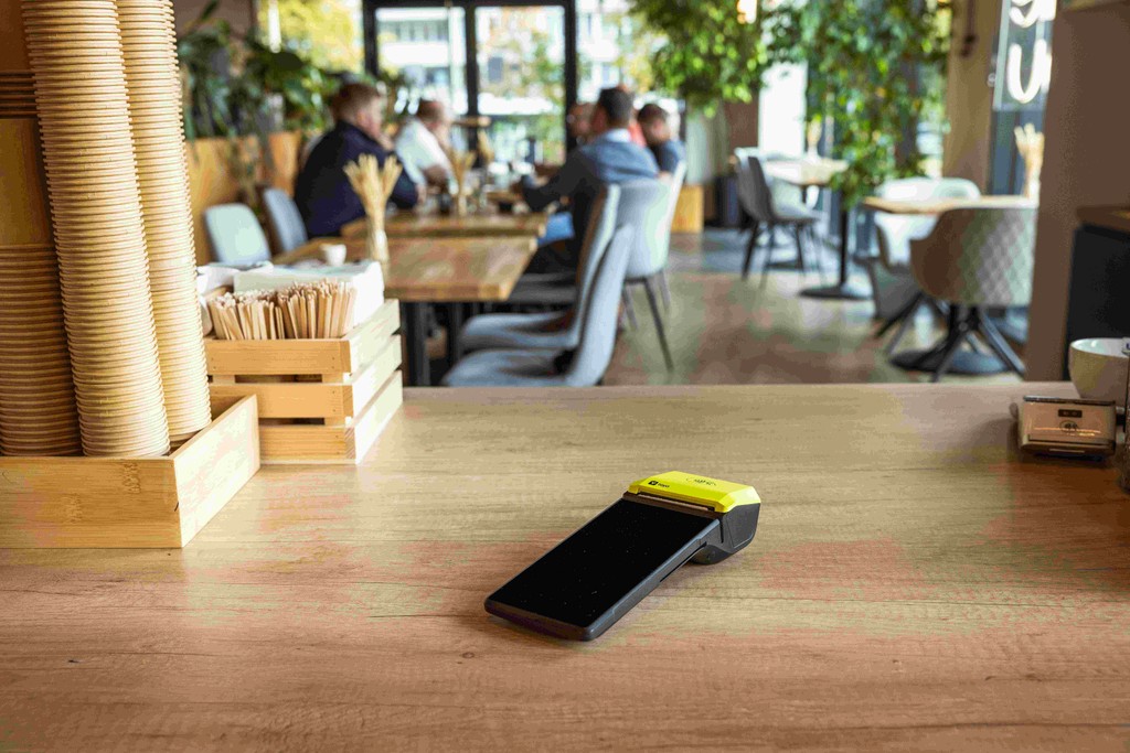 a Teya card machine over a café counter