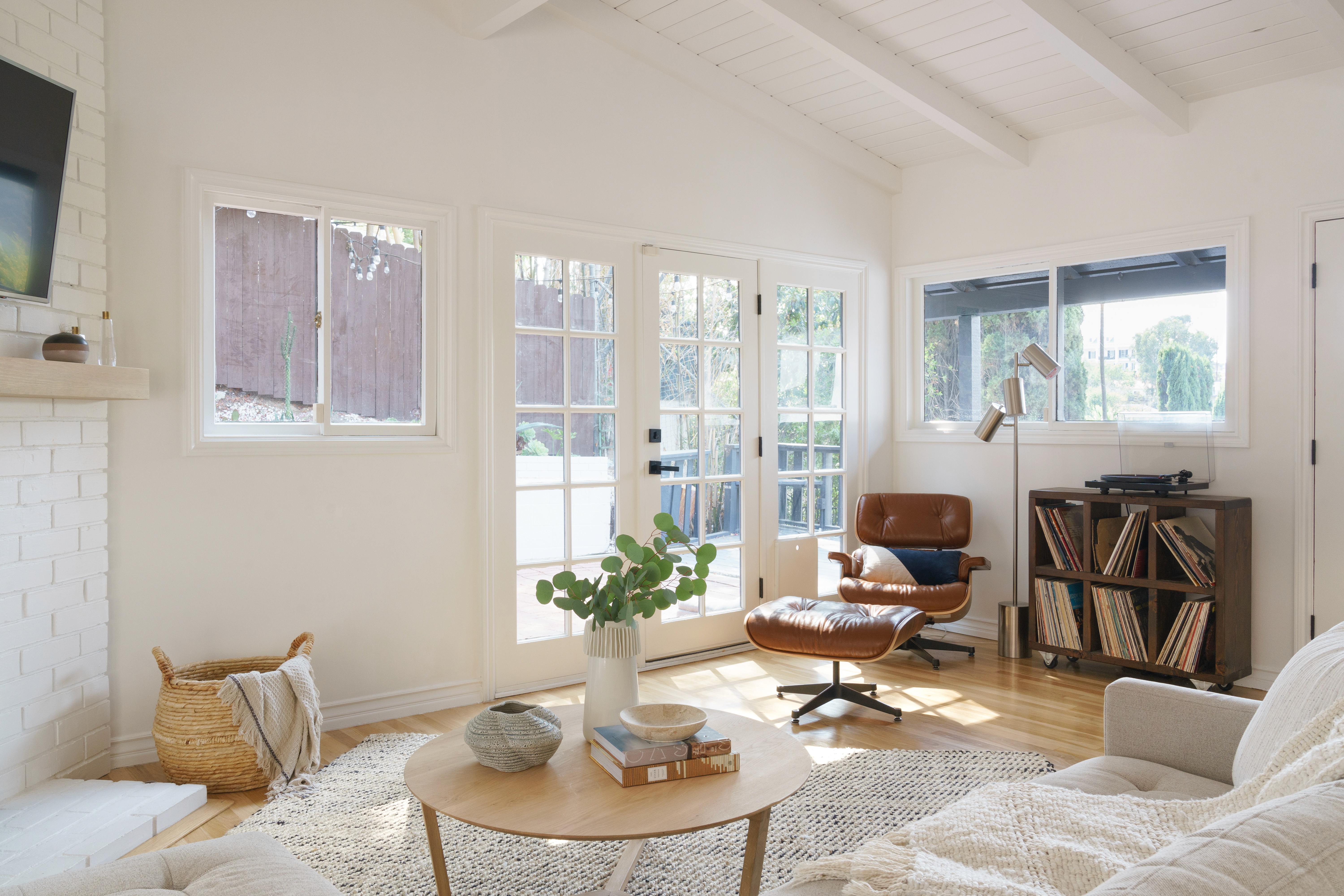 Mid-century living room refresh with a blend of classic design and contemporary comfort  by Ventura & Los Angeles interior designer Jubilee Interiors