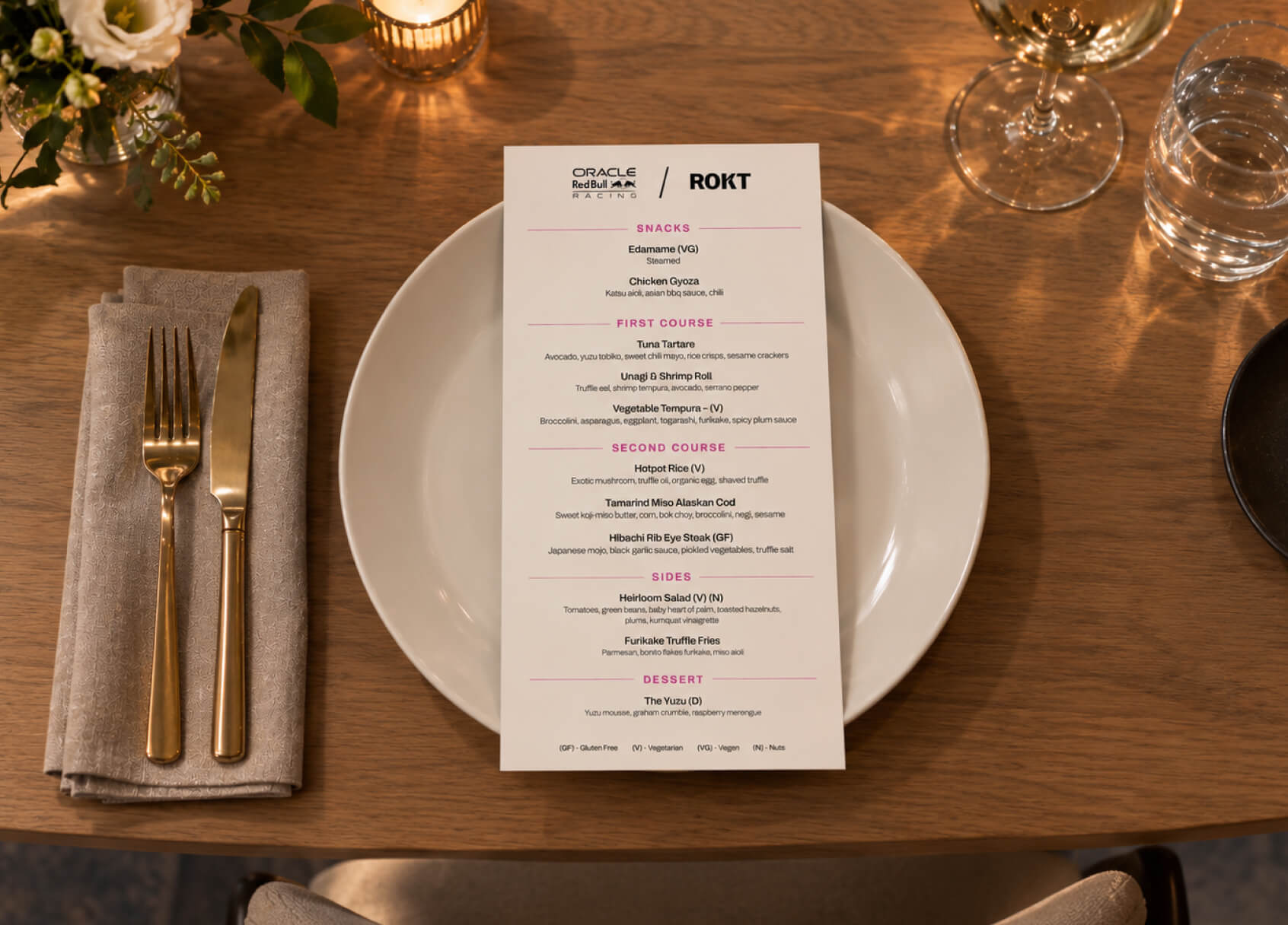 Printed food menu on a formal plate setting