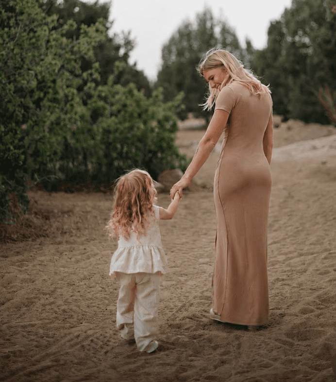 Bre and Nevaeh walking hand in hand