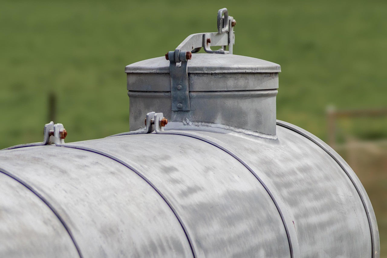 Domed RCC water tank on field.