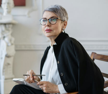 A psychiatrist with a pen and notebook