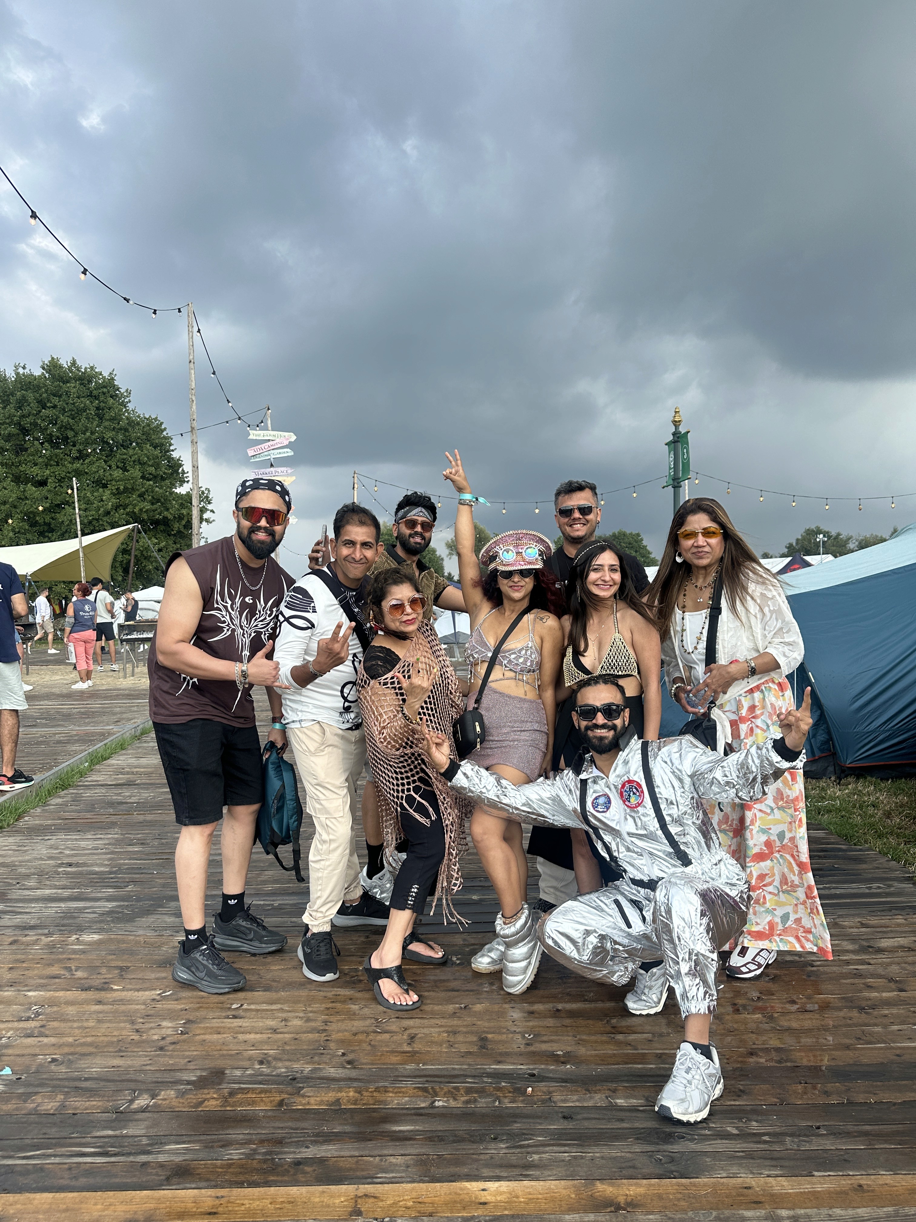 2 boys and girl playing soccer during daytime