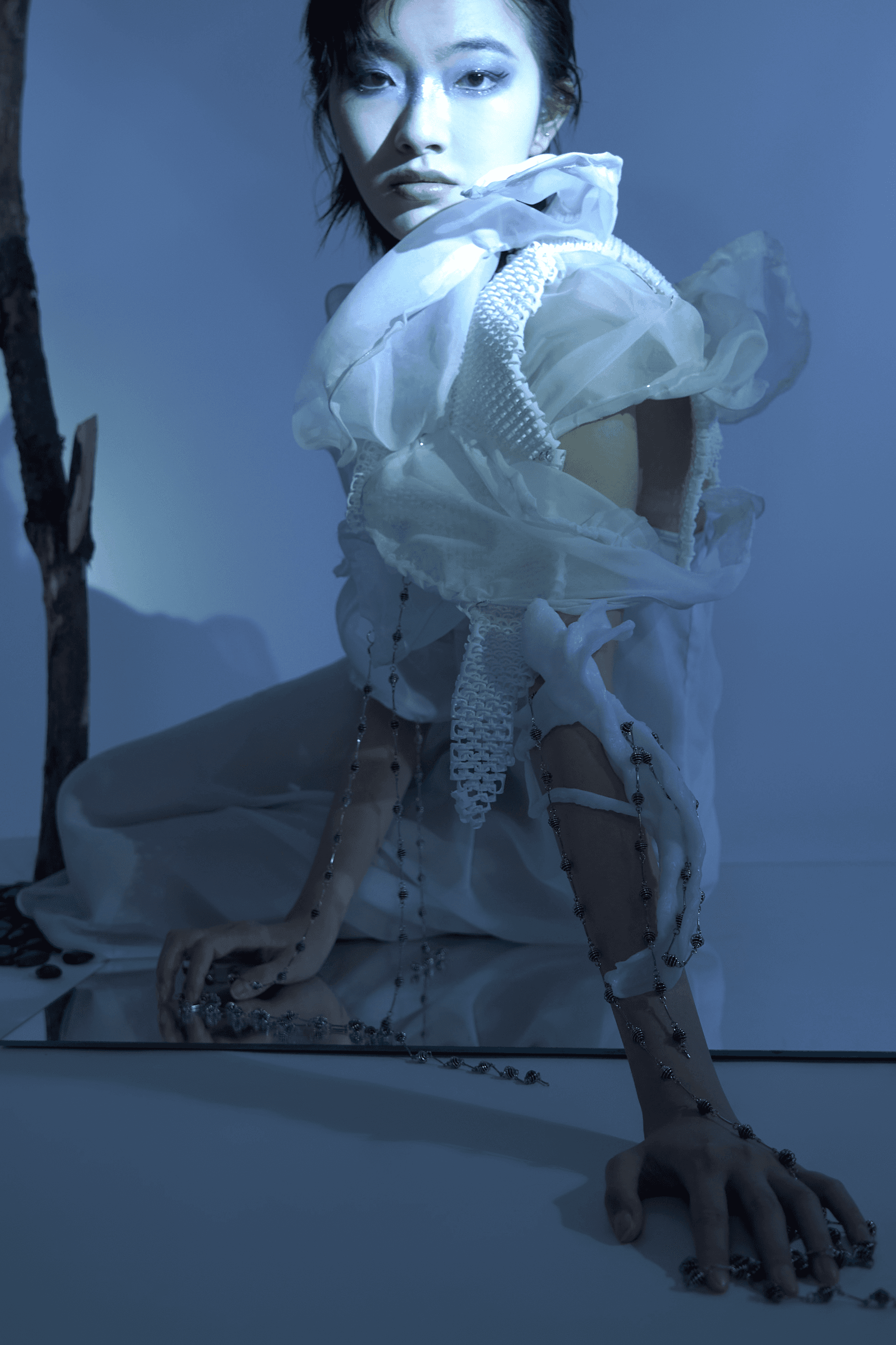 Lollipop with reflection of earth on blue background