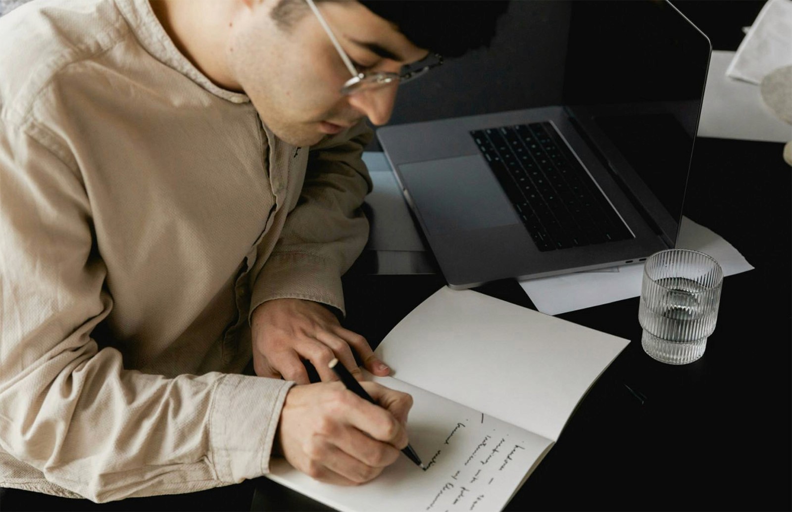 Man Taking Meeting Notes