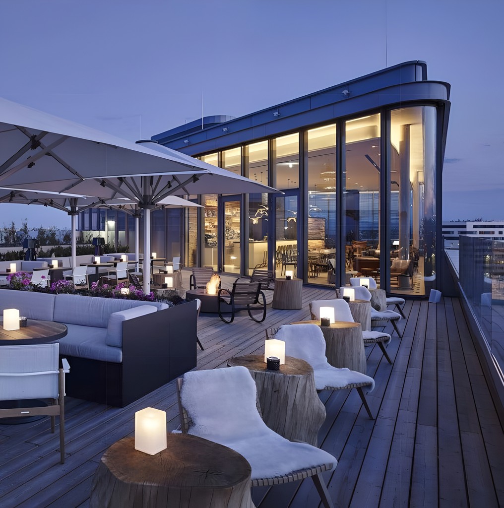 Scenic rooftop view from the new hotel featuring the Yacht Royal and the vibrant waterfront below.