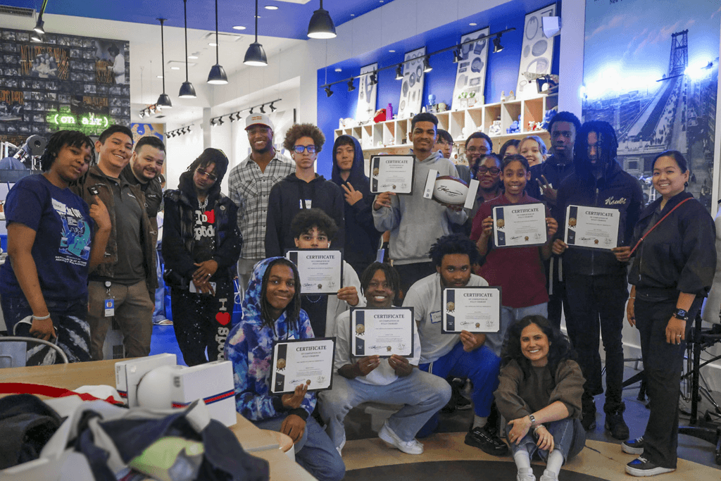 Justin Reid with participants holding certificates