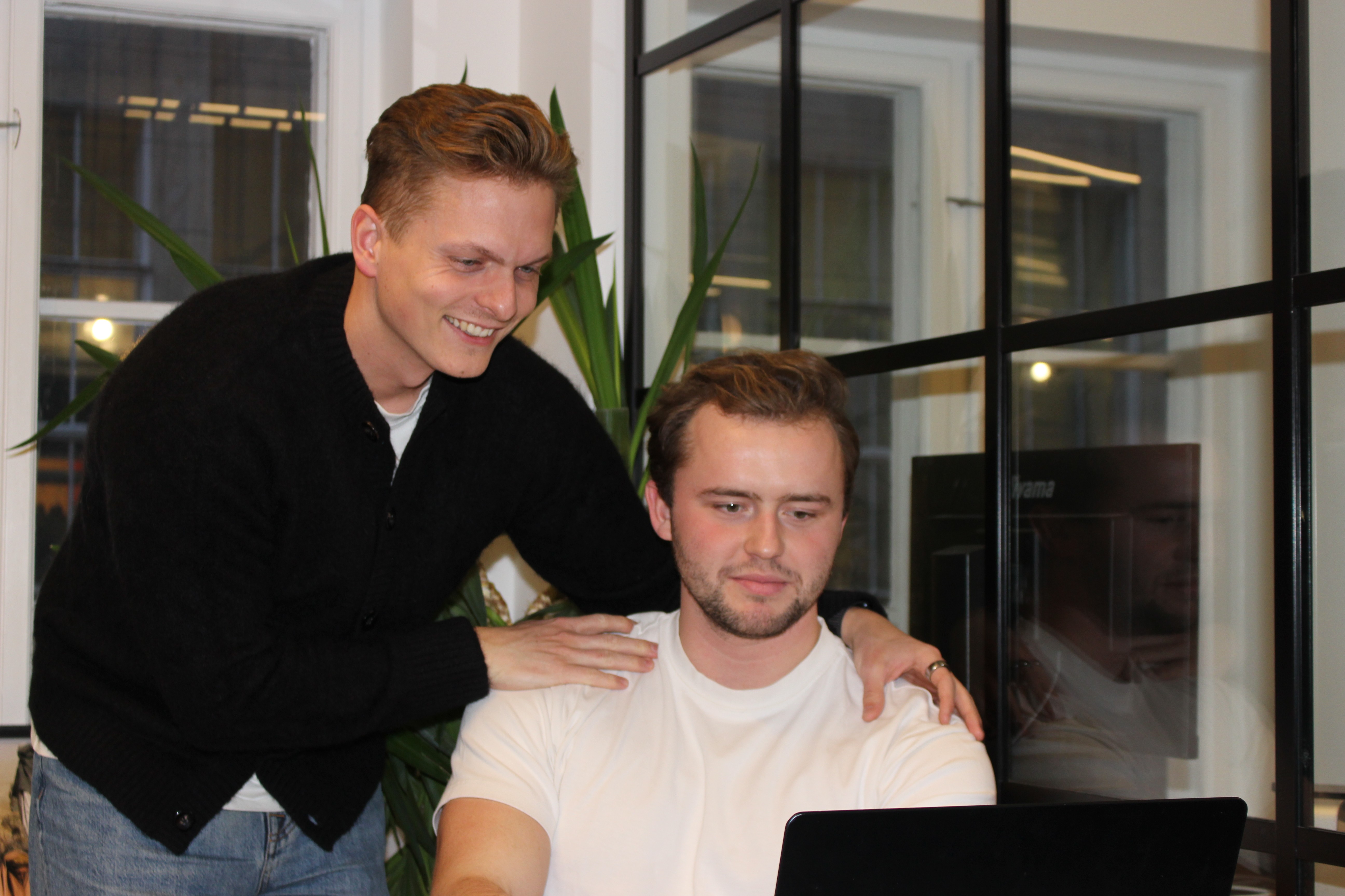 Close-up of a matte black and red modern bike frame with minimalist design