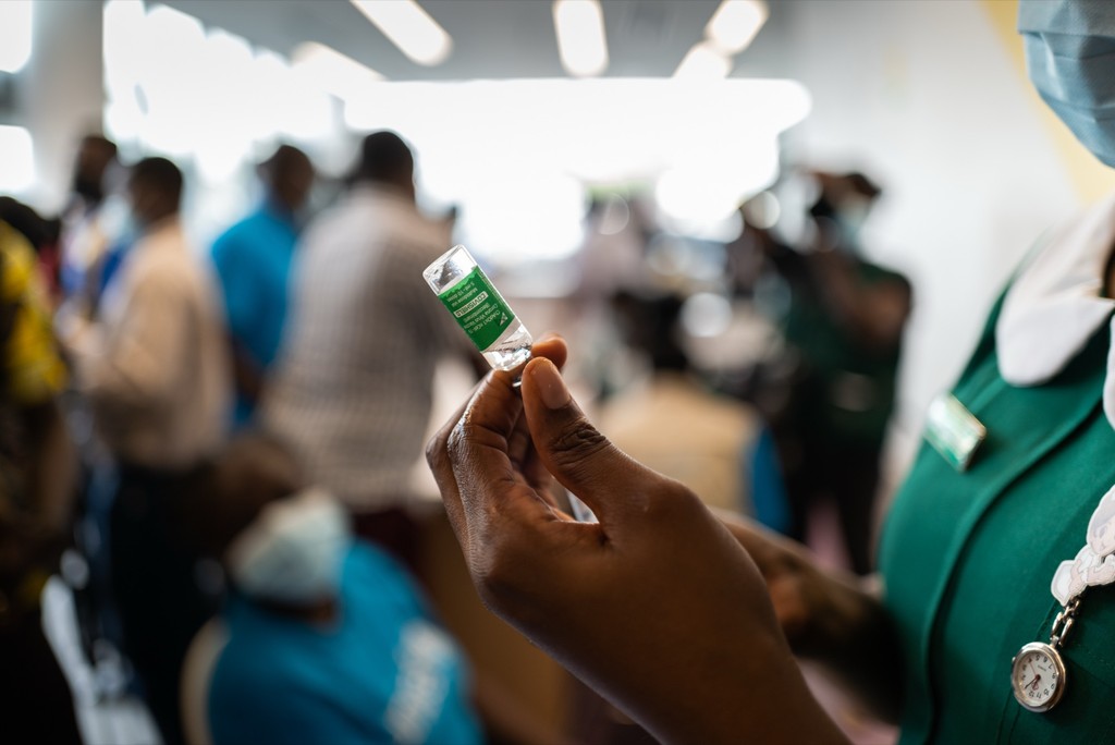 A nurse holds up a vial of COVID-19 vaccine before a vaccination at Ridge Hospital, Accra, Ghana