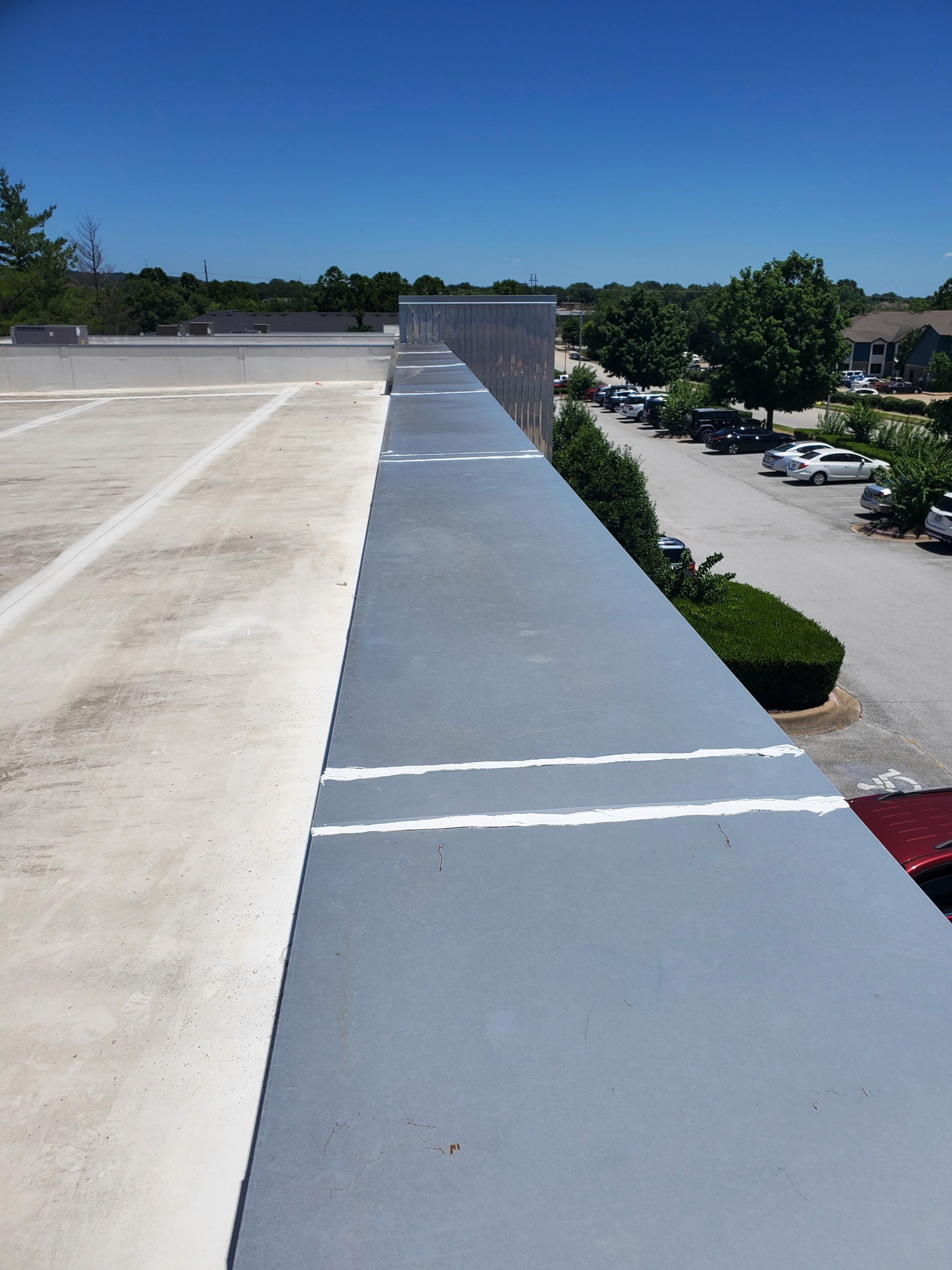 Commercial Roofing - TPO Roof Re-sealing Cap that was leaking 