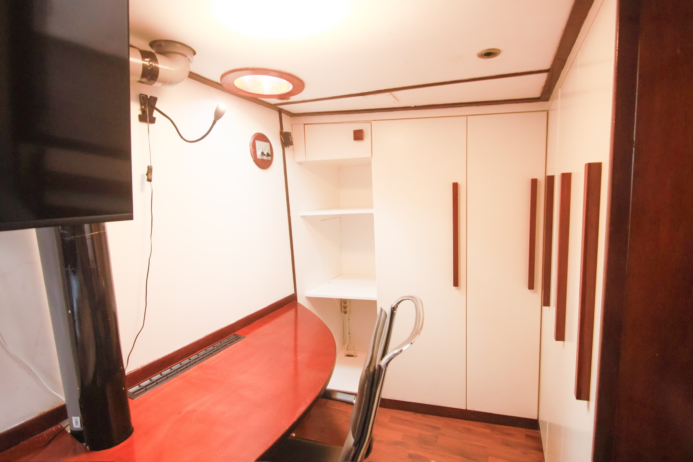 Classic bedroom with canopy bed and patterned pillows