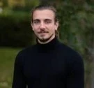 Benjamin T.