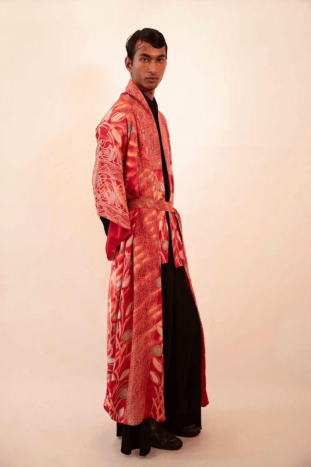 Lalita is our one-of-a-kind red printed silk kimono, handcrafted by skilled artisans in-house using a vintage silk sari.