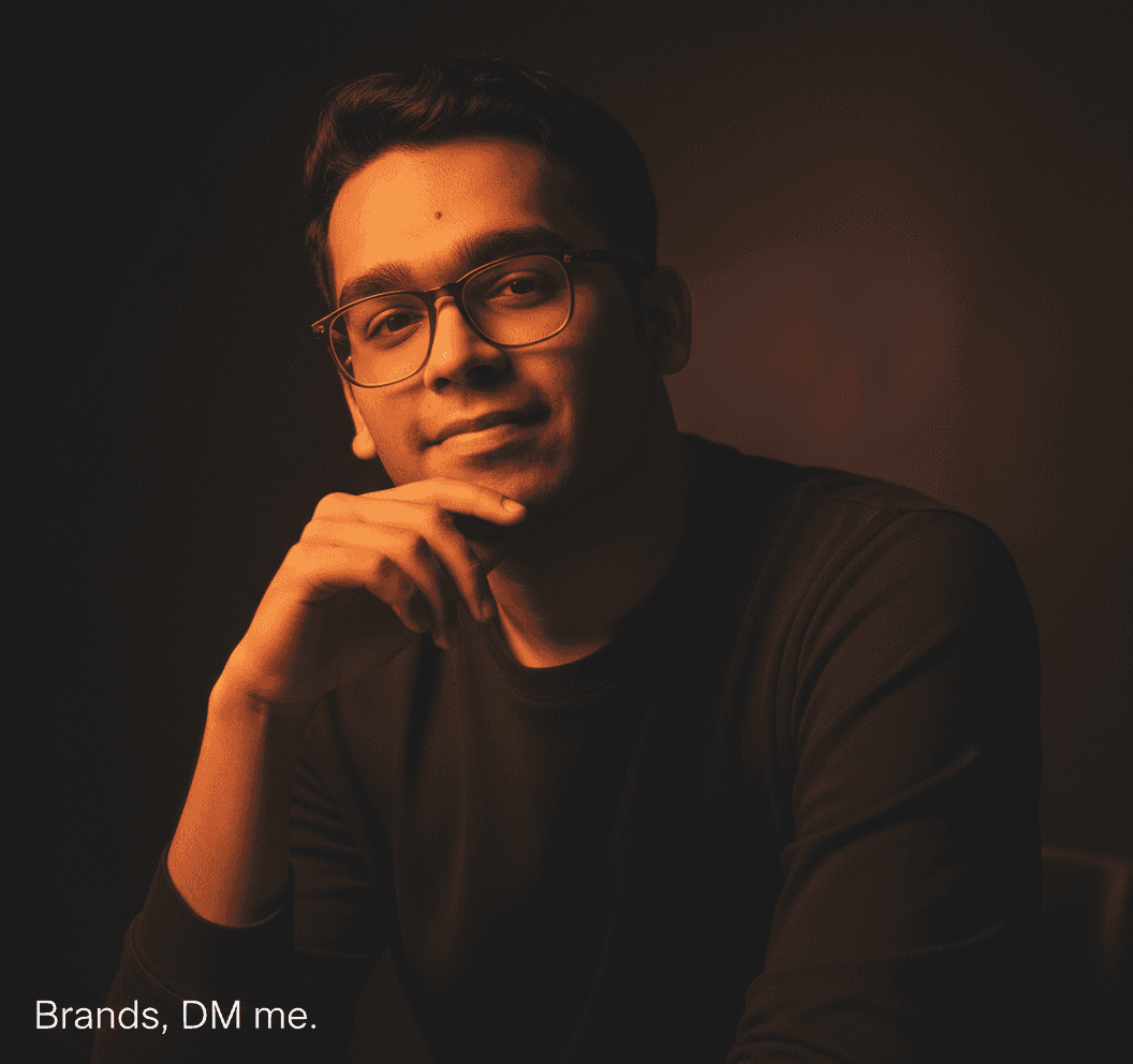 a woman in a black suit and sunglasses