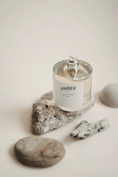 Fragrance bottle on stones