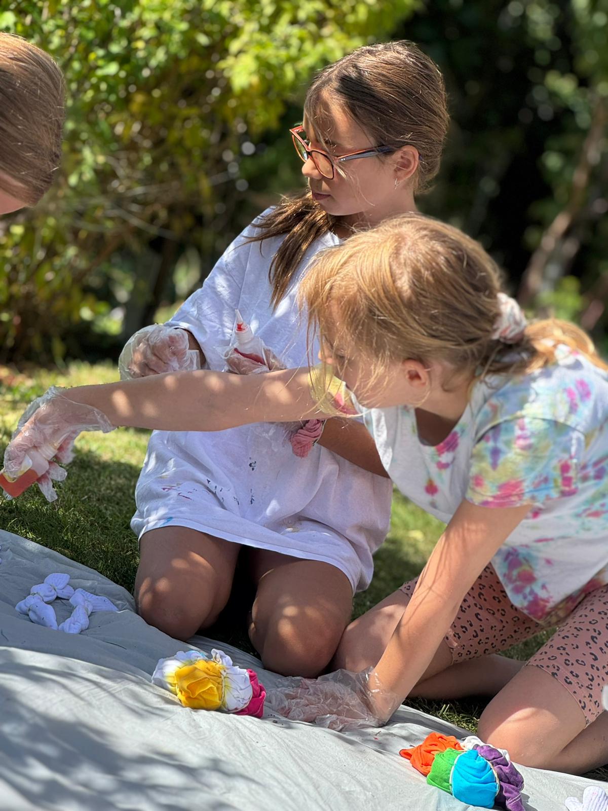 A bride in an elegant white lace gown with a floral crown.
