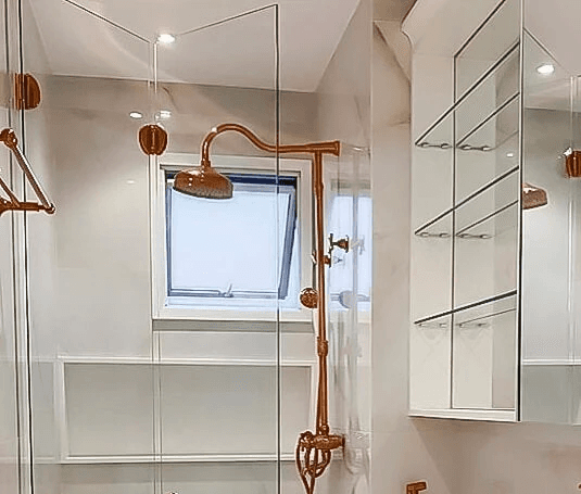 man wearing gray polo shirt beside dry-erase board