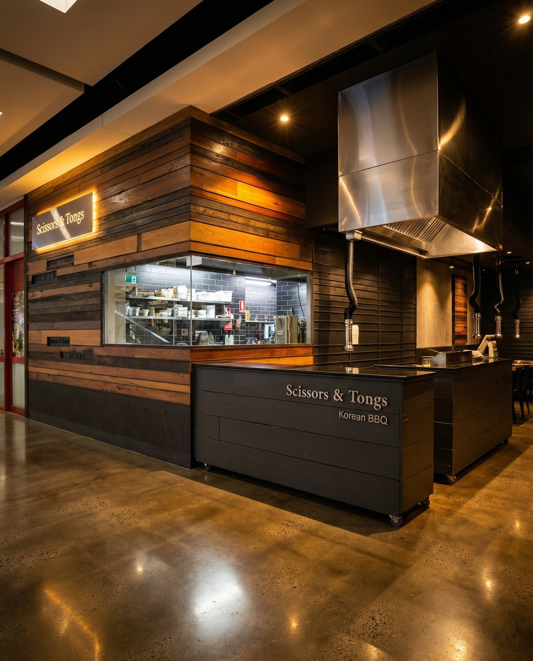 Wood-panelled entrance and reception counter at Scissors & Tongs Rhodes