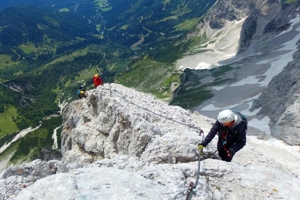 climbers on a via ferrata route