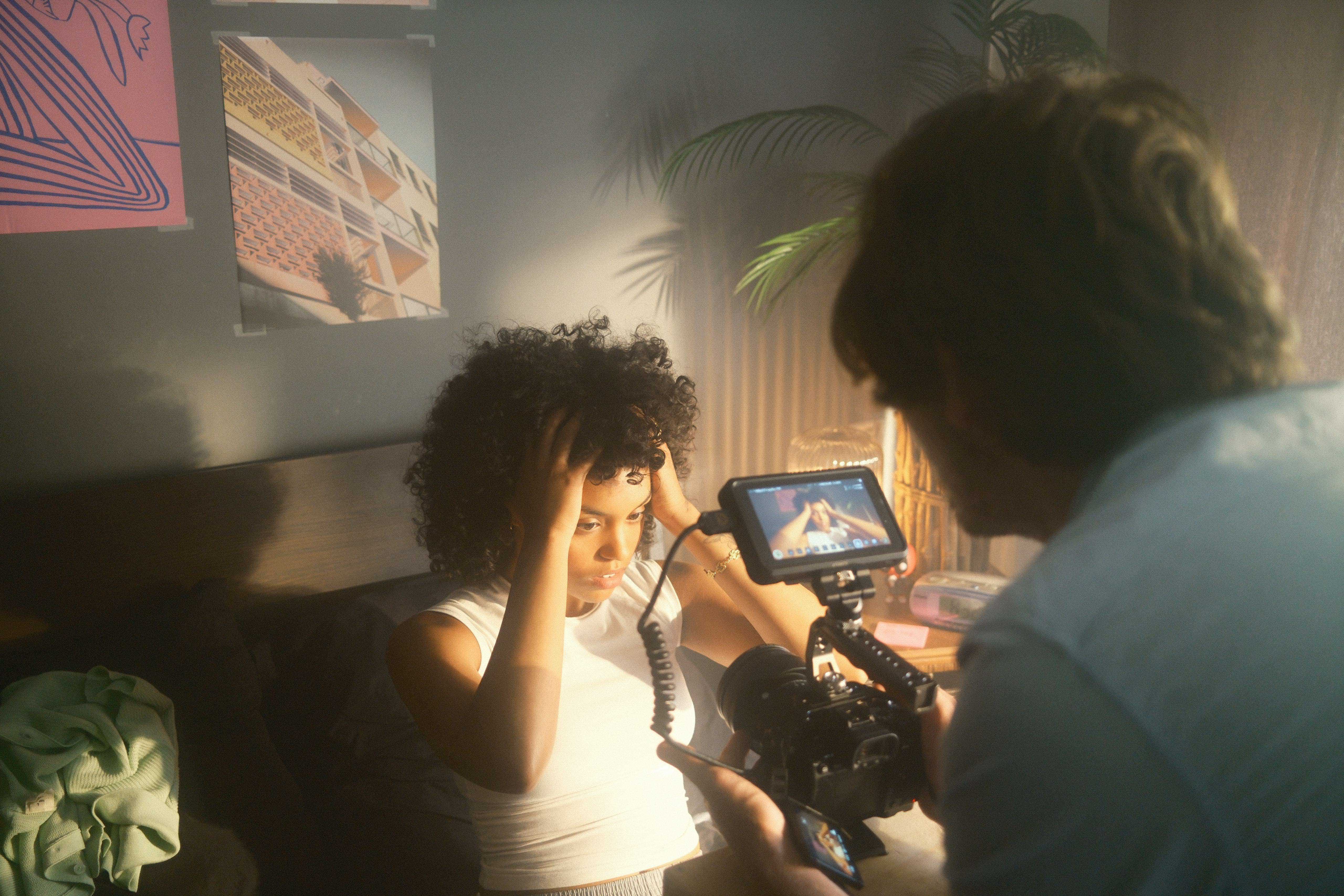 Streetside billboard with flyposters of the Batch.Works brand and illustrations