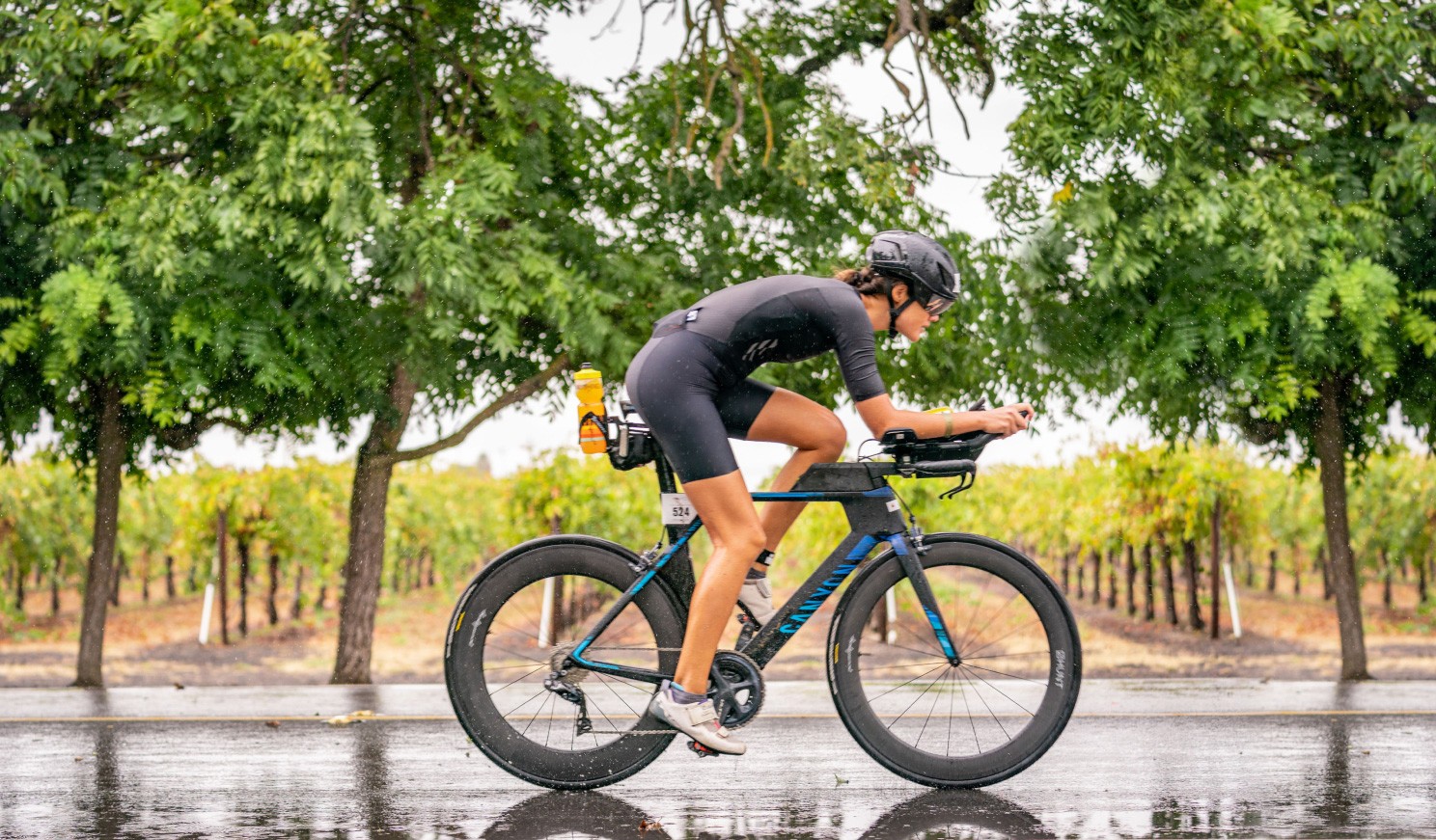 Ashley from Maui Myofuctional Therapy racing in an ironman on her bike