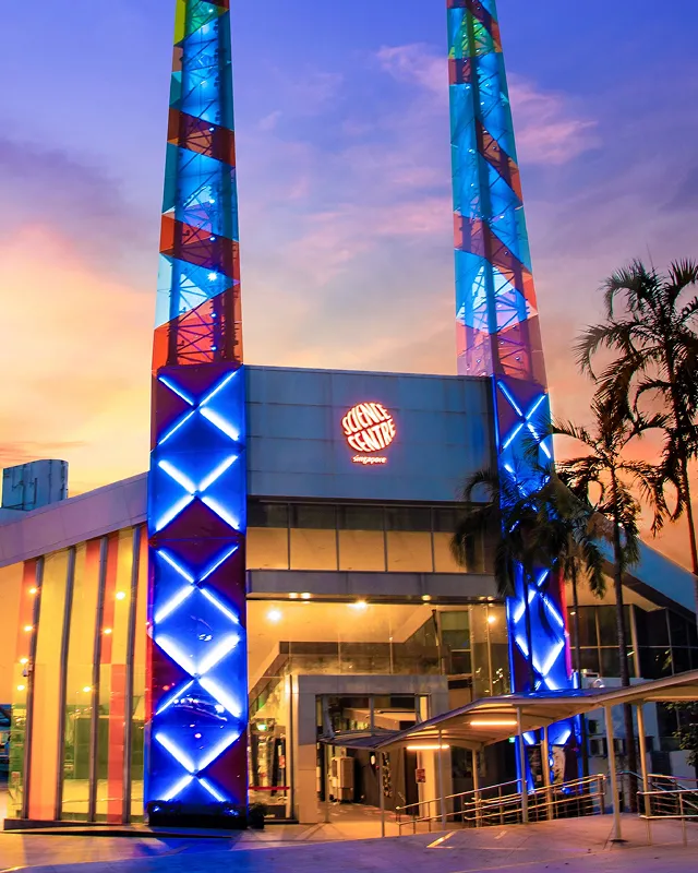 Young girl with backpack walks on dirt path