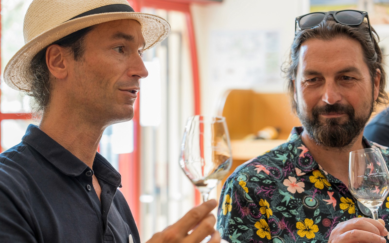 Men enjoying wine tasting on a morning tour in Cezanne countryside.