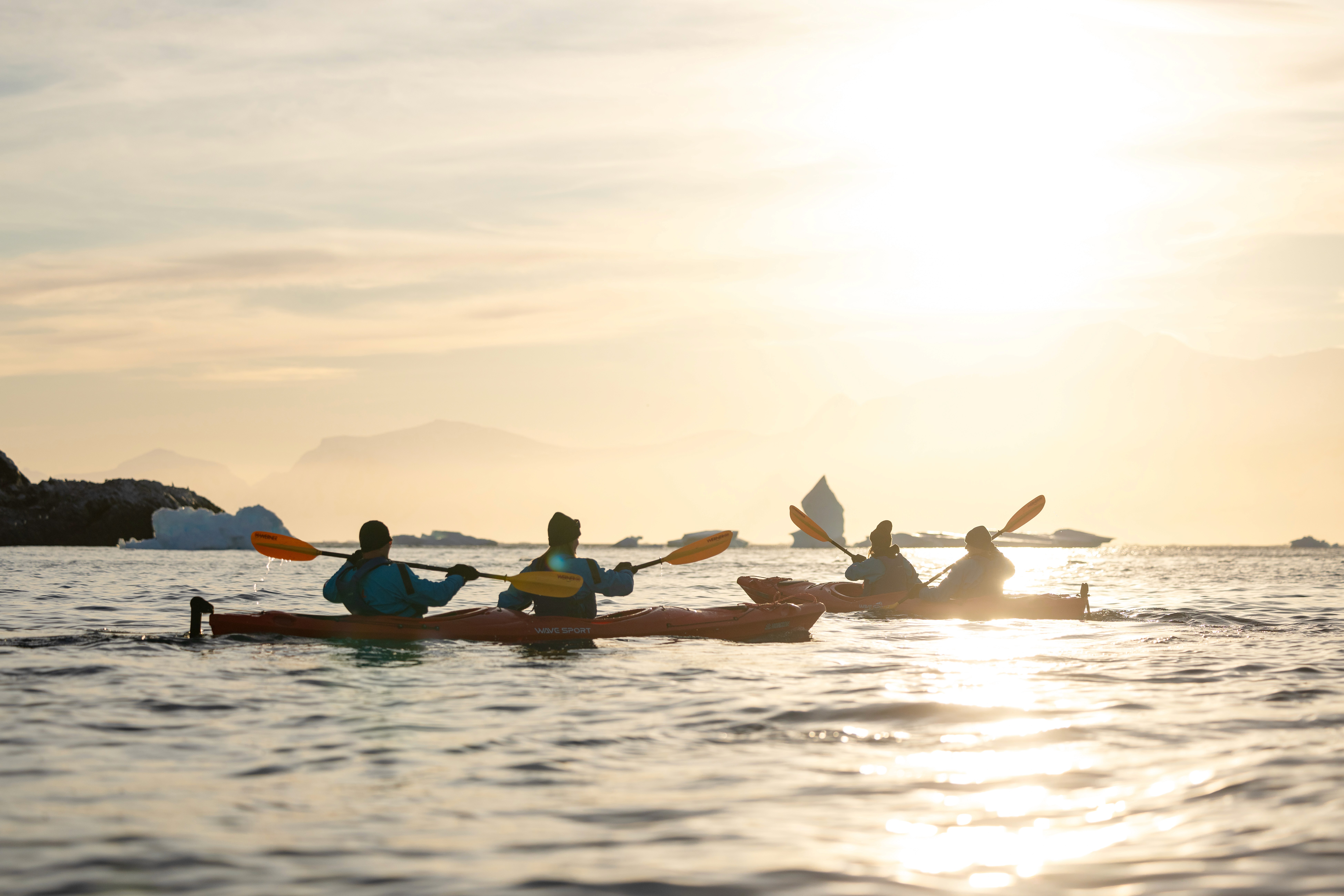 Kayaking in the permanent daylight in Antarctica